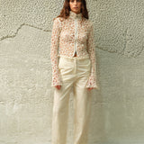 JUN - Embroidered fluted top with front zipper