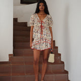 KAIA - Flower print semi-sheer mesh mini skirt with ruffles