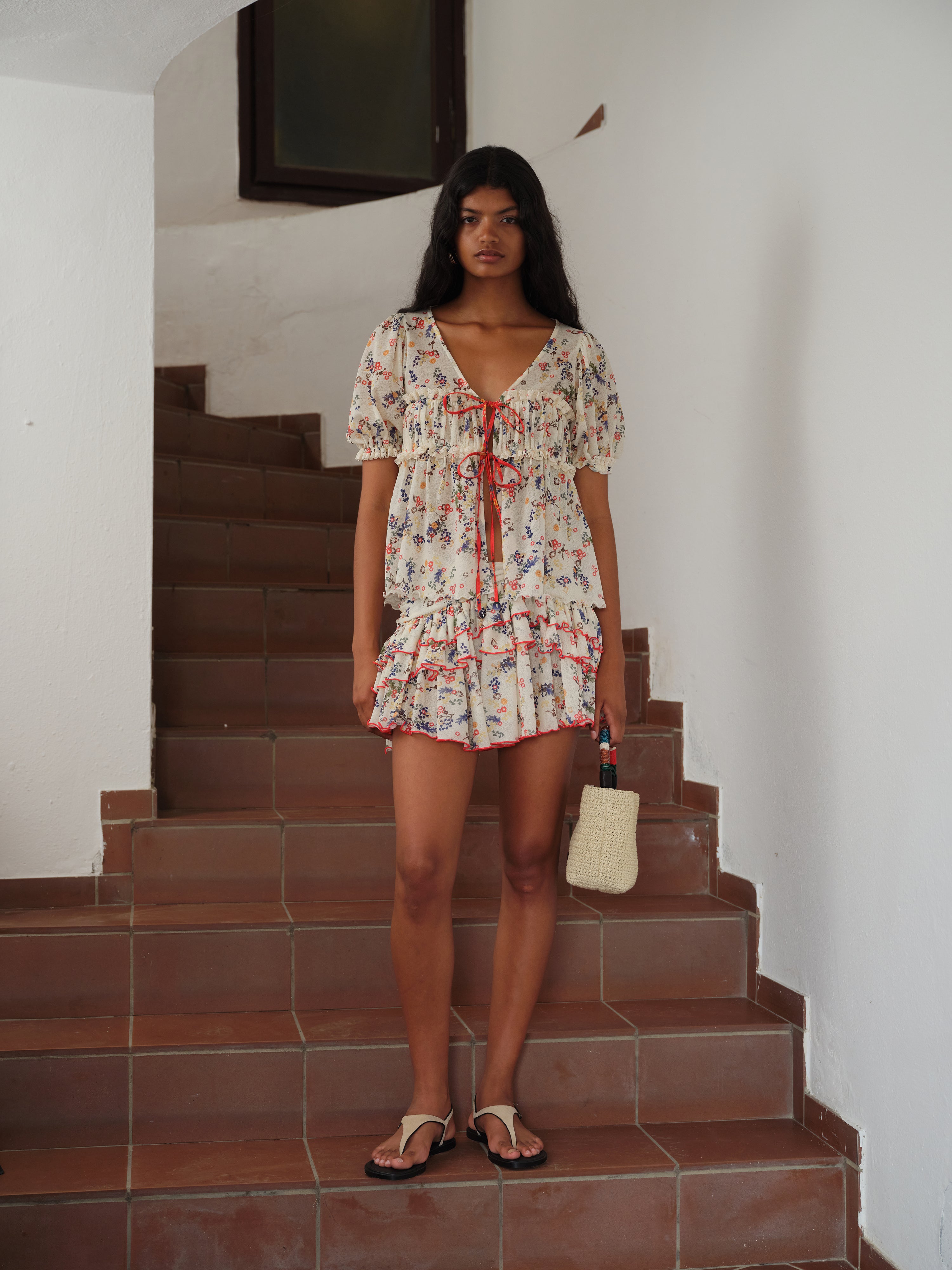 KAIA - Flower print semi-sheer mesh mini skirt with ruffles