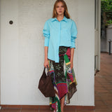 LUMIER - Patchwork draped skirt with knot detail and asymmetrical hem
