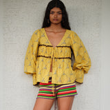 RIBY - Yellow printed flared-sleeve top