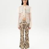 STELLA - Sheer chiffon long-sleeve blouse with  deep V-neck design